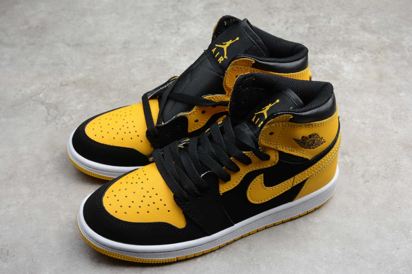 kids yellow and black jordans