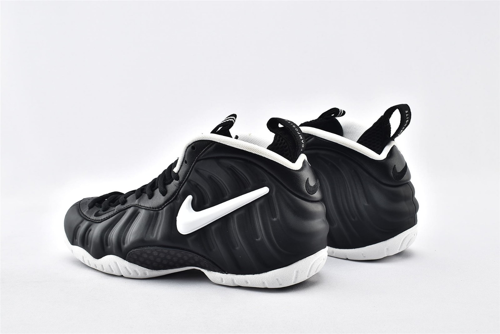 one black one white basketball shoes