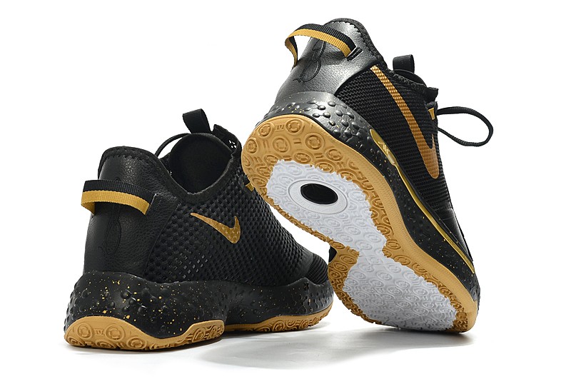 paul george shoes black and gold